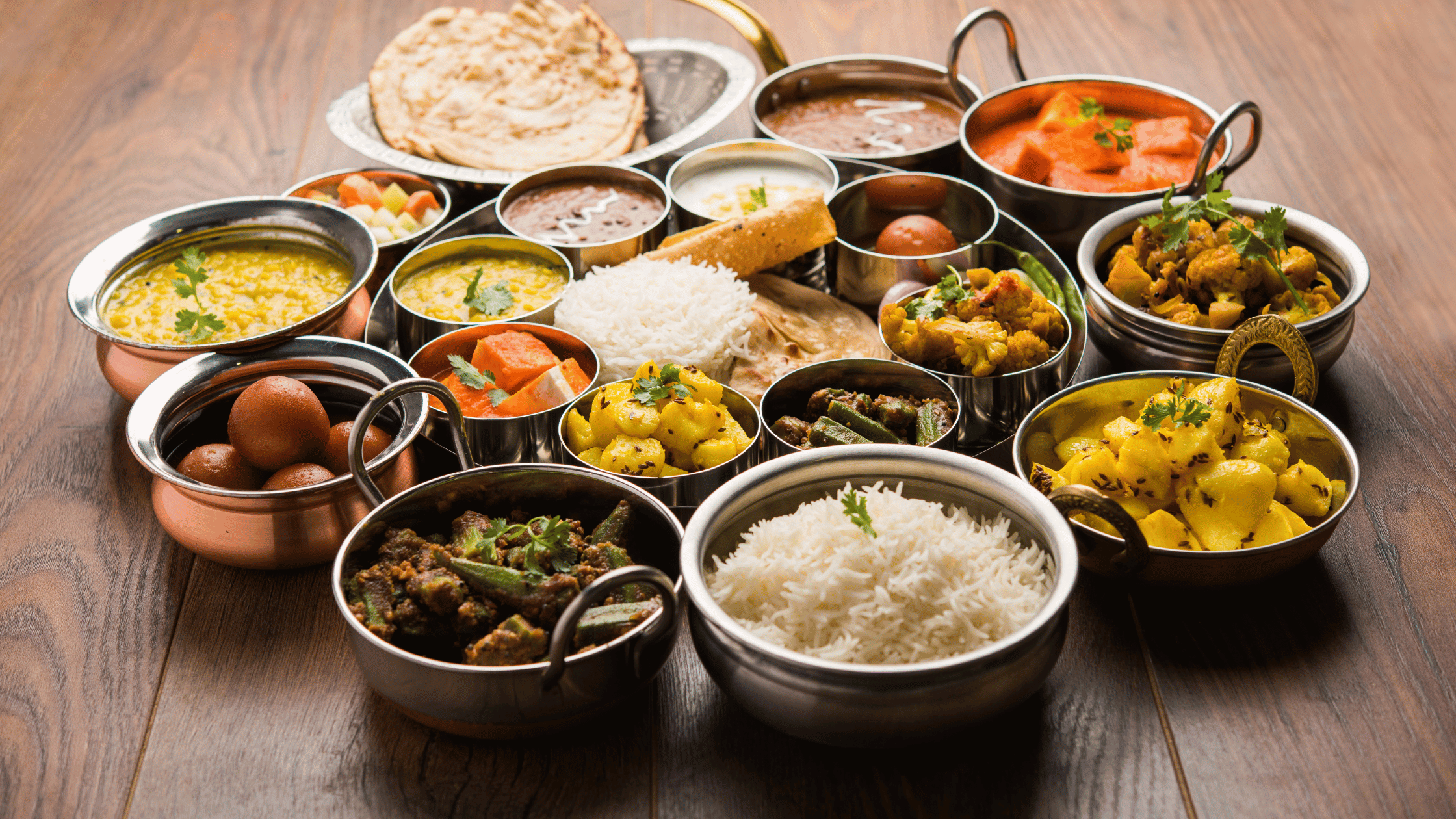 Indian foods served in the silver vessels