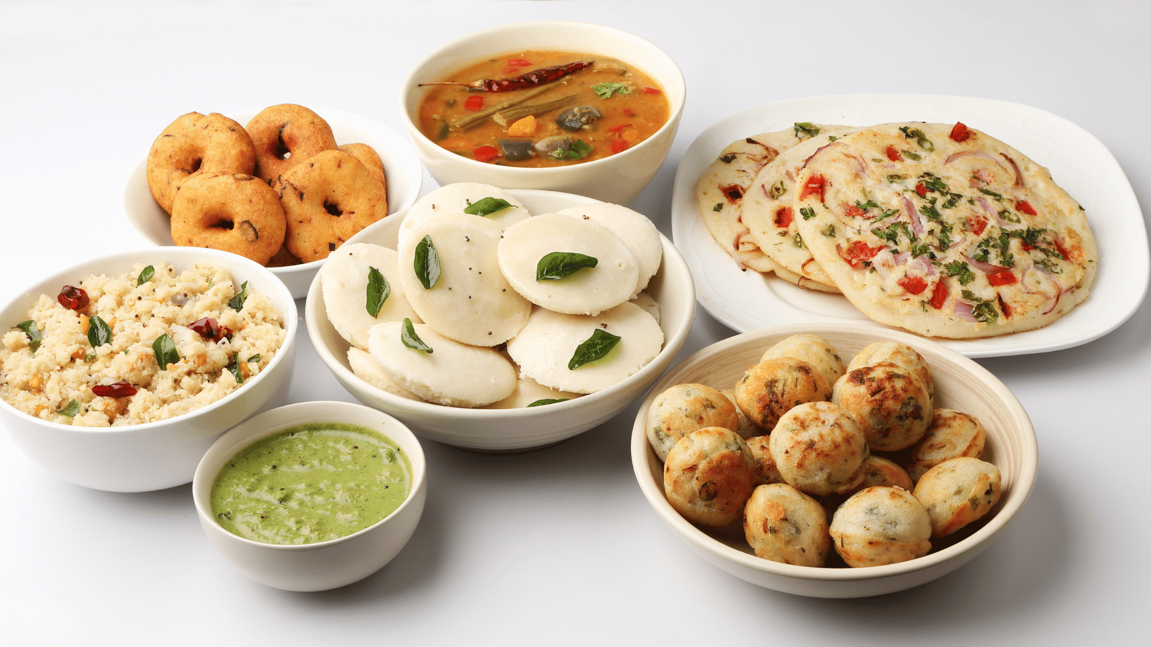 Authentic South Indian breakfast dishes including idli, vada, uttapam, pongal, and chutney served fresh at the best Indian cuisine restaurant